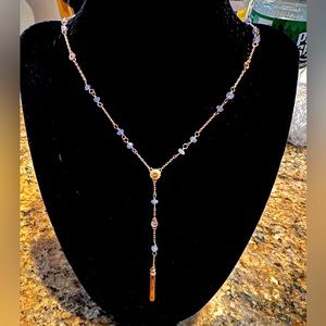 Henri Bendel rose gold with blue crystals Y necklace.